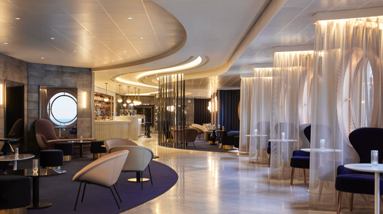 Upgraded suite cabin interior achieved through bidding on Virgin Voyages
