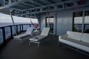 Cheeky Corner Suite: Panoramic Views from the Stern of Virgin Voyages