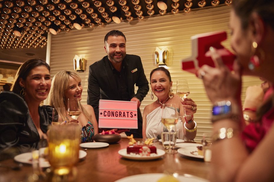 Group of friends enjoying a free cruise through Circle Groups on Virgin Voyages