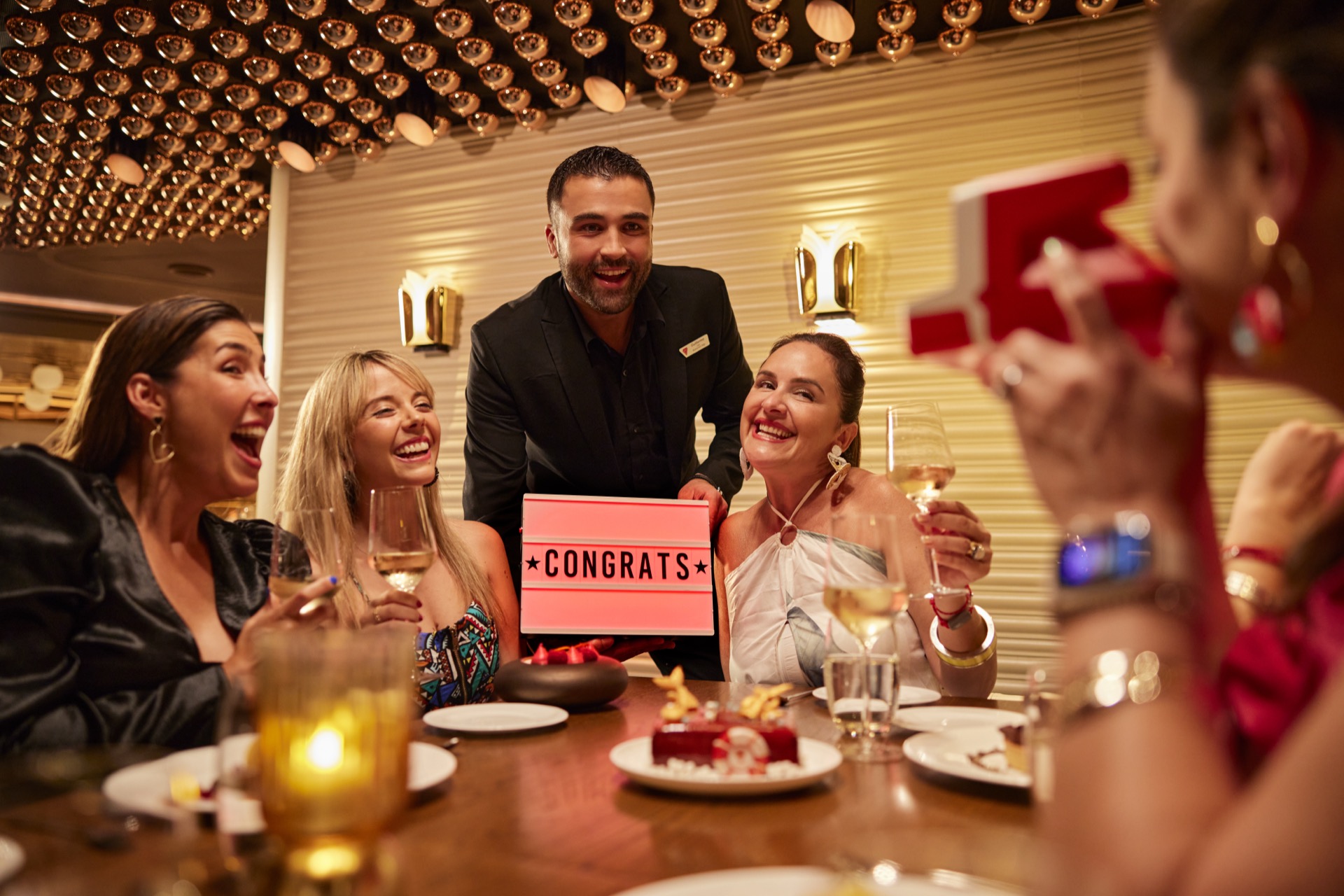Group of friends enjoying a free cruise through Circle Groups on Virgin Voyages