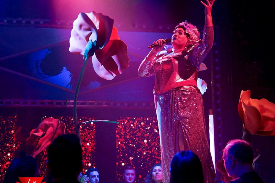 The Red Room transformational theatre set up for a performance on Virgin Voyages