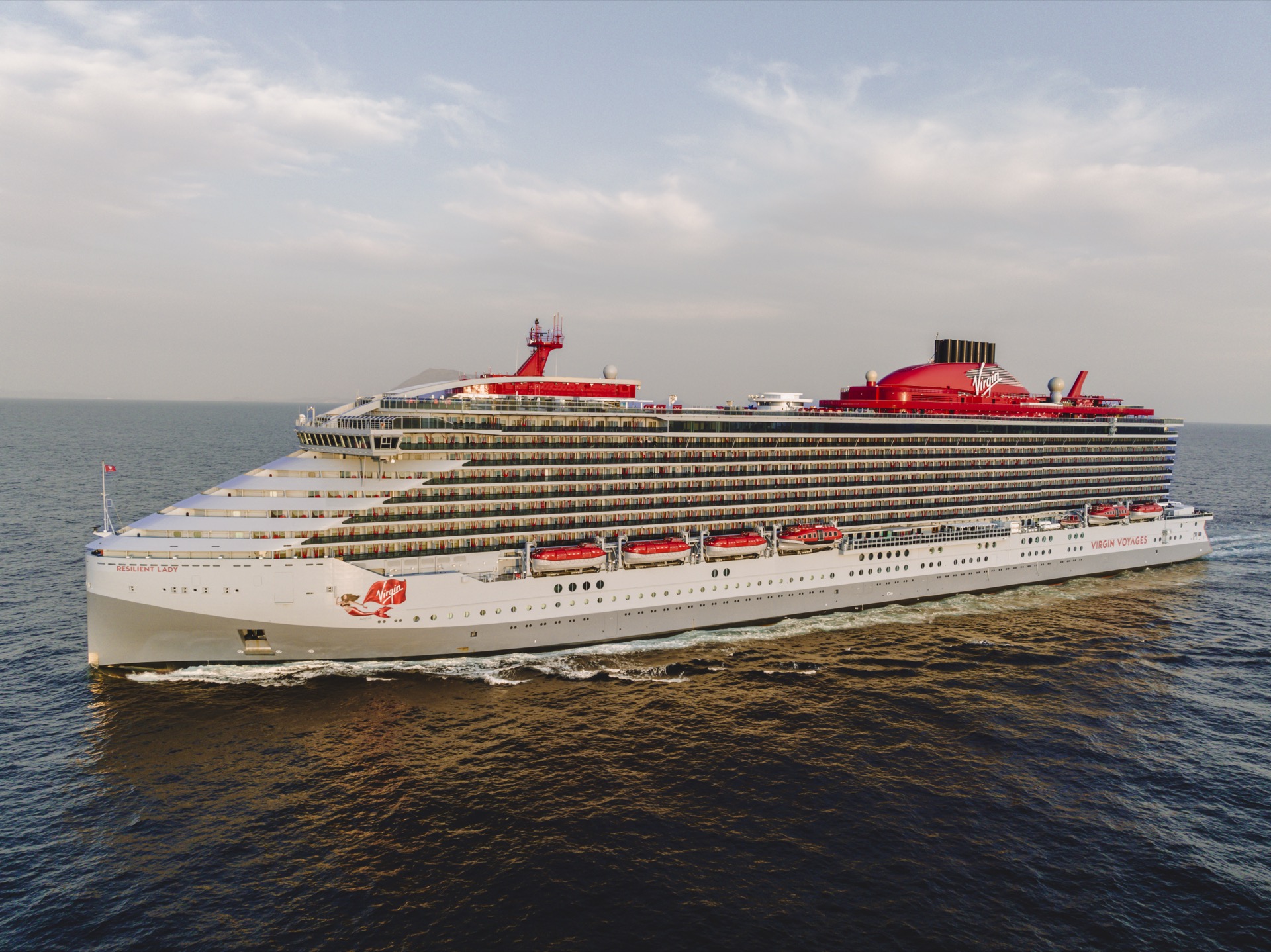 Virgin Voyages Resilient Lady cruise ship exterior at port