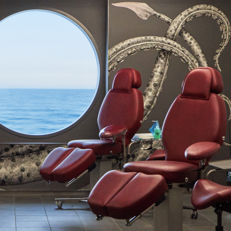 Squid Ink Tattoo parlor where guests can get tattooed at sea on Virgin Voyages