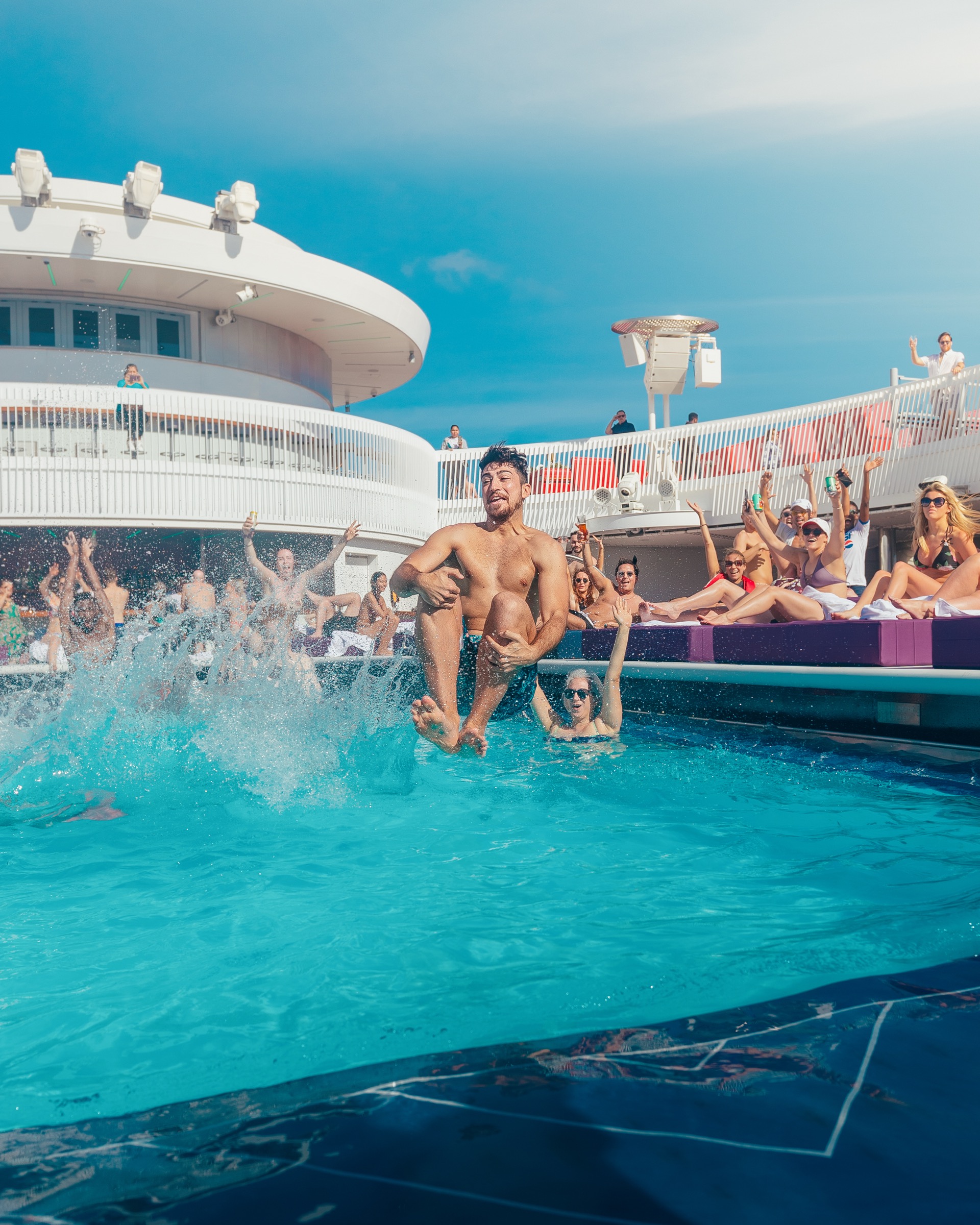 Two-story nightclub The Manor with DJ and dance floor on Virgin Voyages