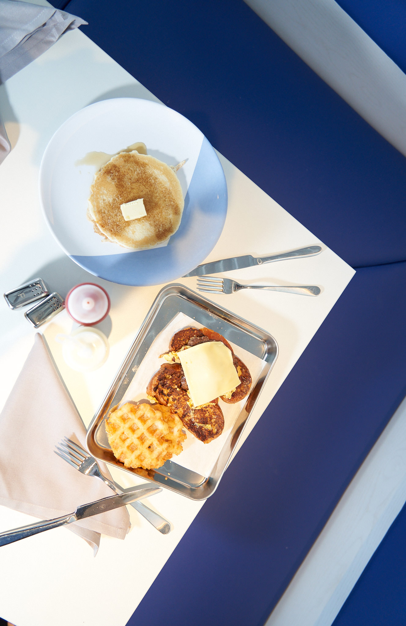 Brunch service at The Wake restaurant with ocean views on Virgin Voyages