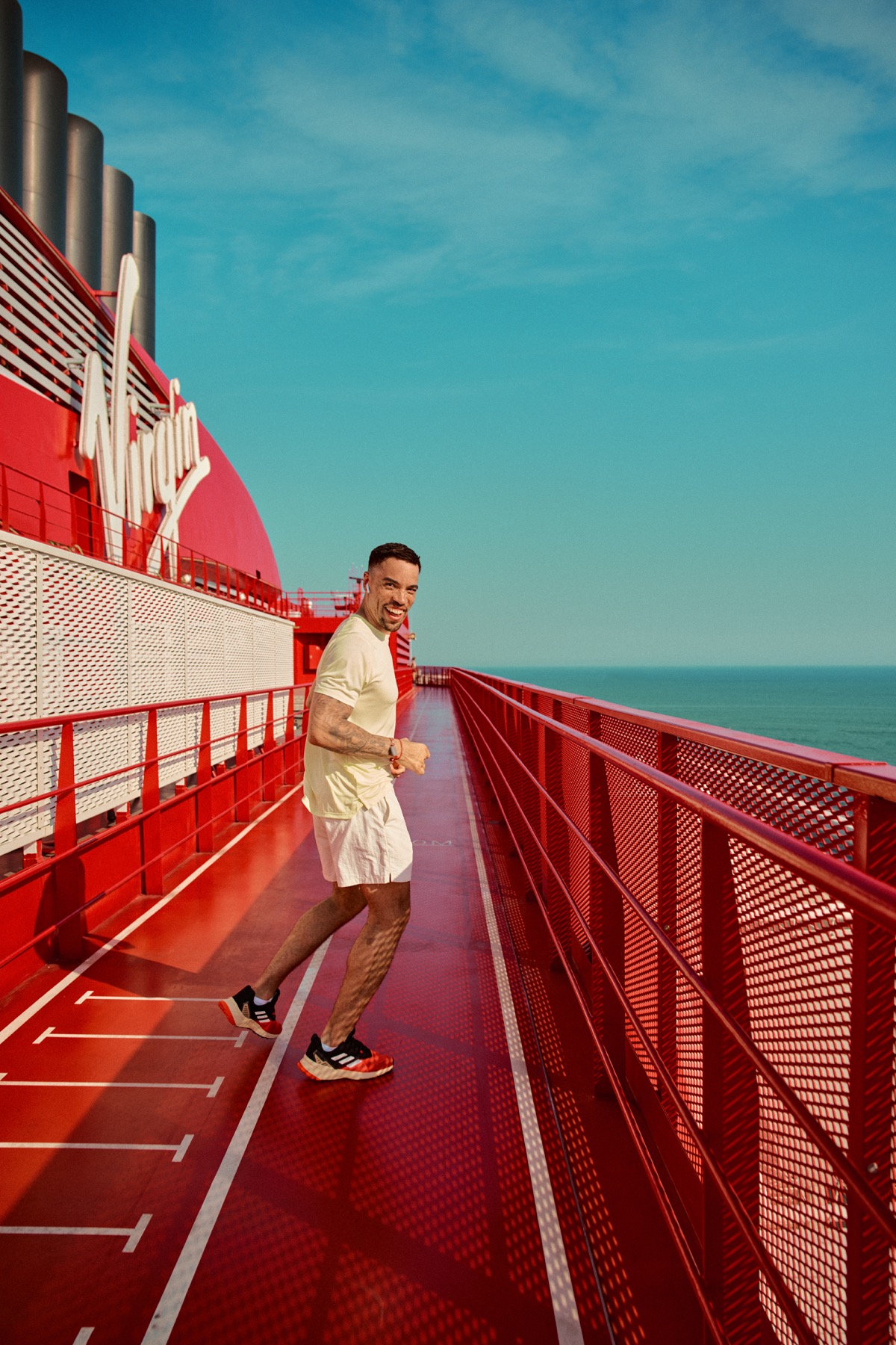Sailors enjoying onboard amenities included in Virgin Voyages fare types