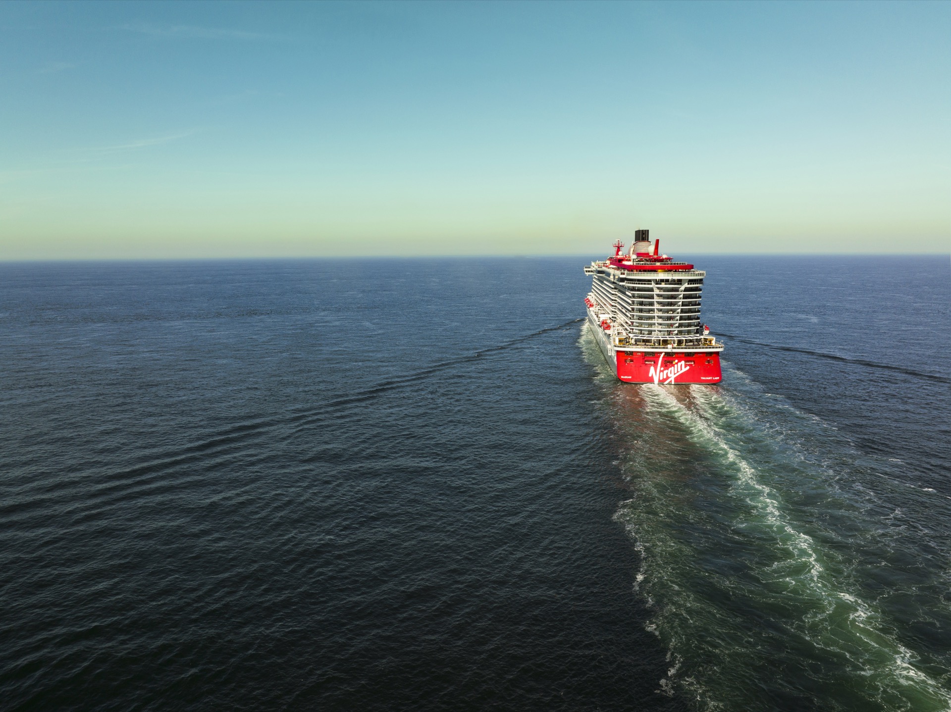 Virgin Voyages ship at sea representing the adult-only cruise experience
