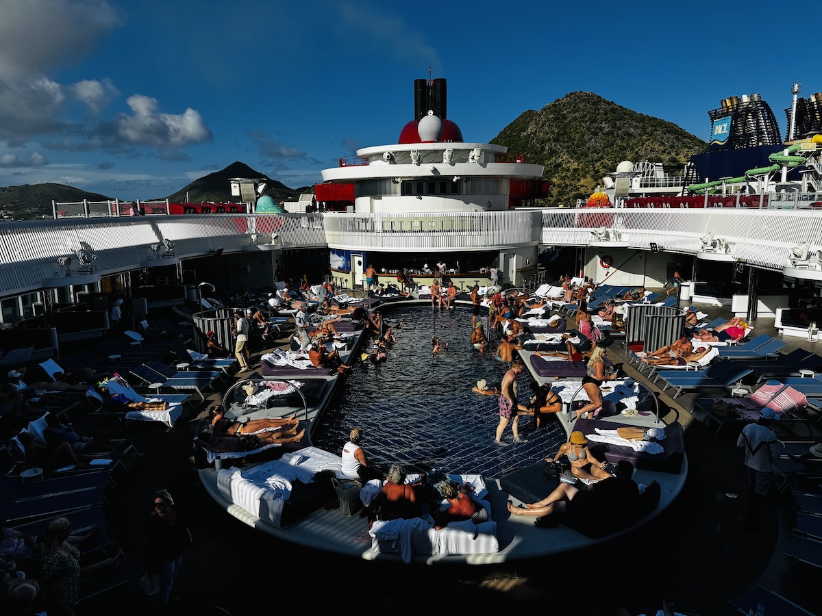 The main pool on Virgin Voyages