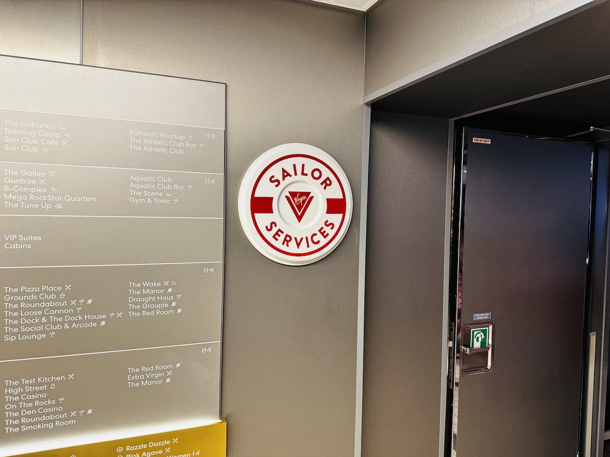 Sailor Services signage on Virgin Voyages