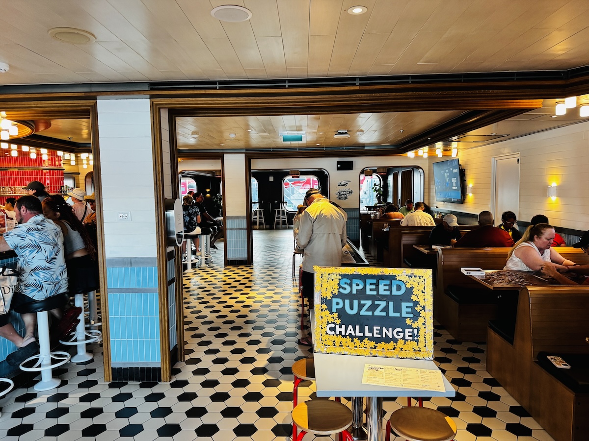 Inside The Social Club lounge on Virgin Voyages